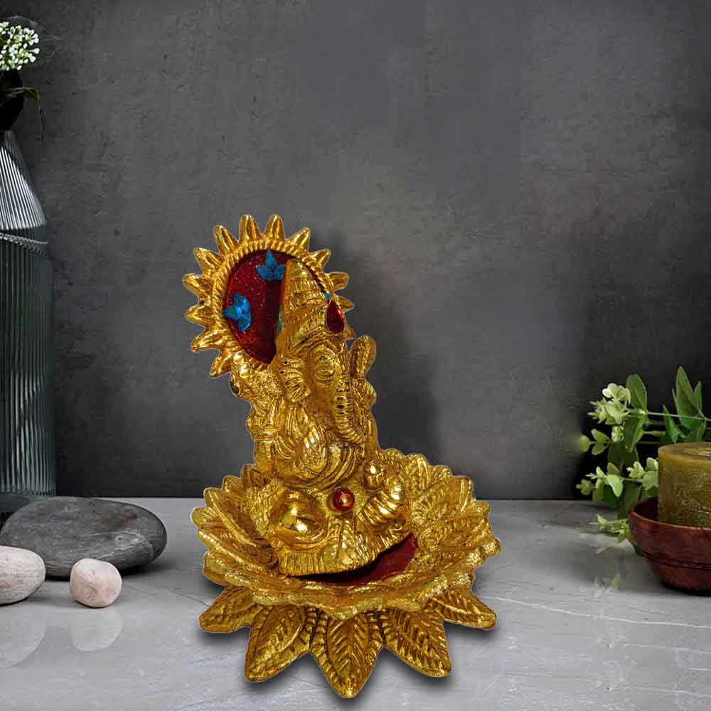 Lord Ganesha Statue Sitting On Lotus Flower